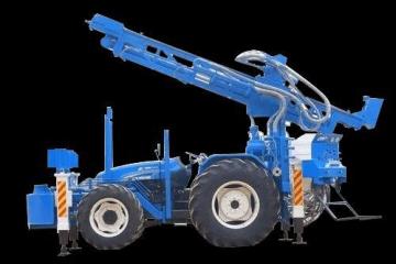 TRACTOR MOUNTED DRILLING RIG